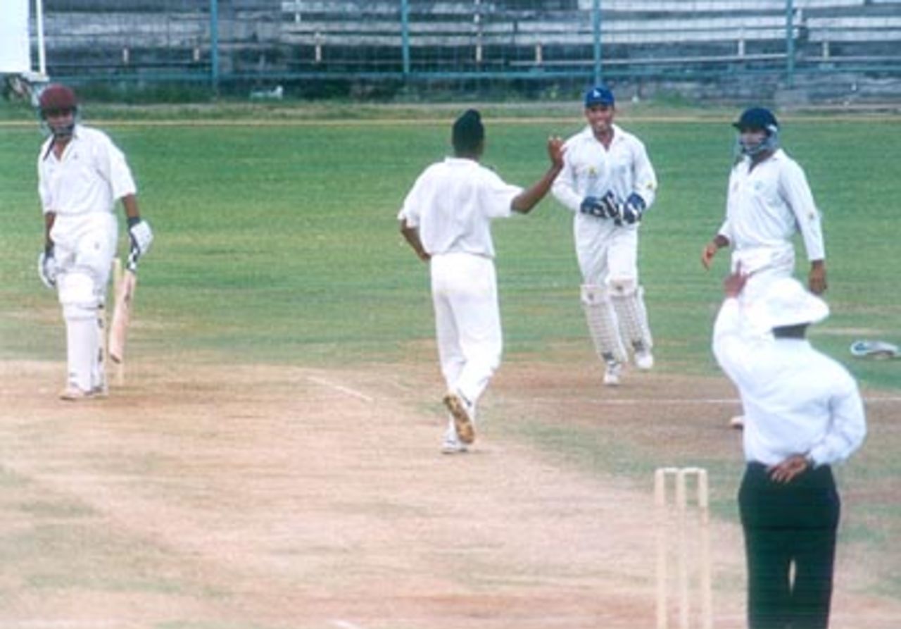 Rajat Bhatia has just been caught at backward short leg by Vikram Rathour (not in picture) off Harbhajan Singh, Tamil Nadu v Punjab (Day 3), Ranji Trophy Quarter Final 2, MA Chidambaram Stadium Chepauk, Chennai, 30 Mar-3 Apr 2000.