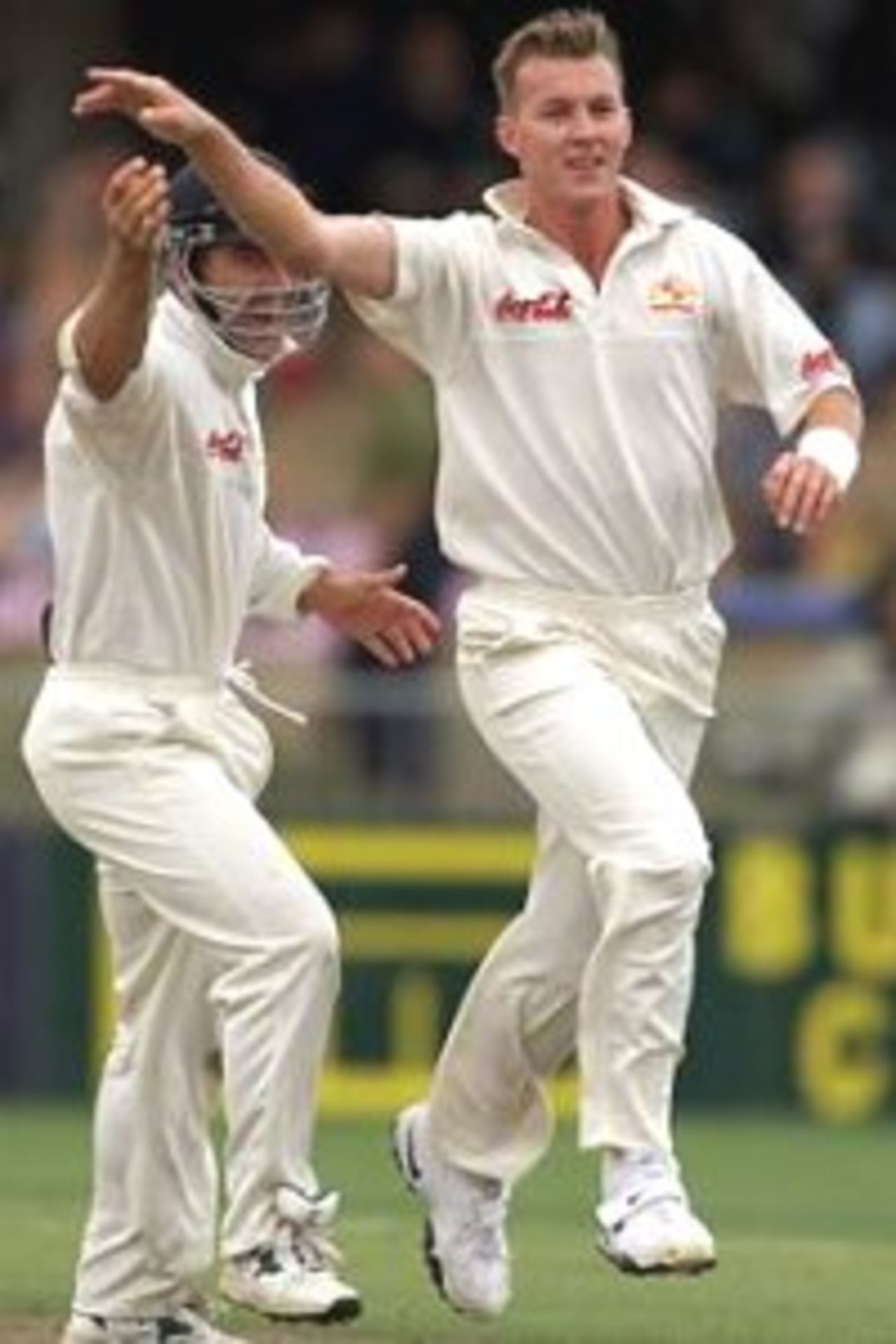 02 Apr 2000: Brett Lee (right) of Australia celebrates with Justin Langer after taking the wicket of Craig Spearman of New Zealand, during day three of the third test between New Zealand and Australia, at WestpacTrustPark, Hamilton, New Zealand.