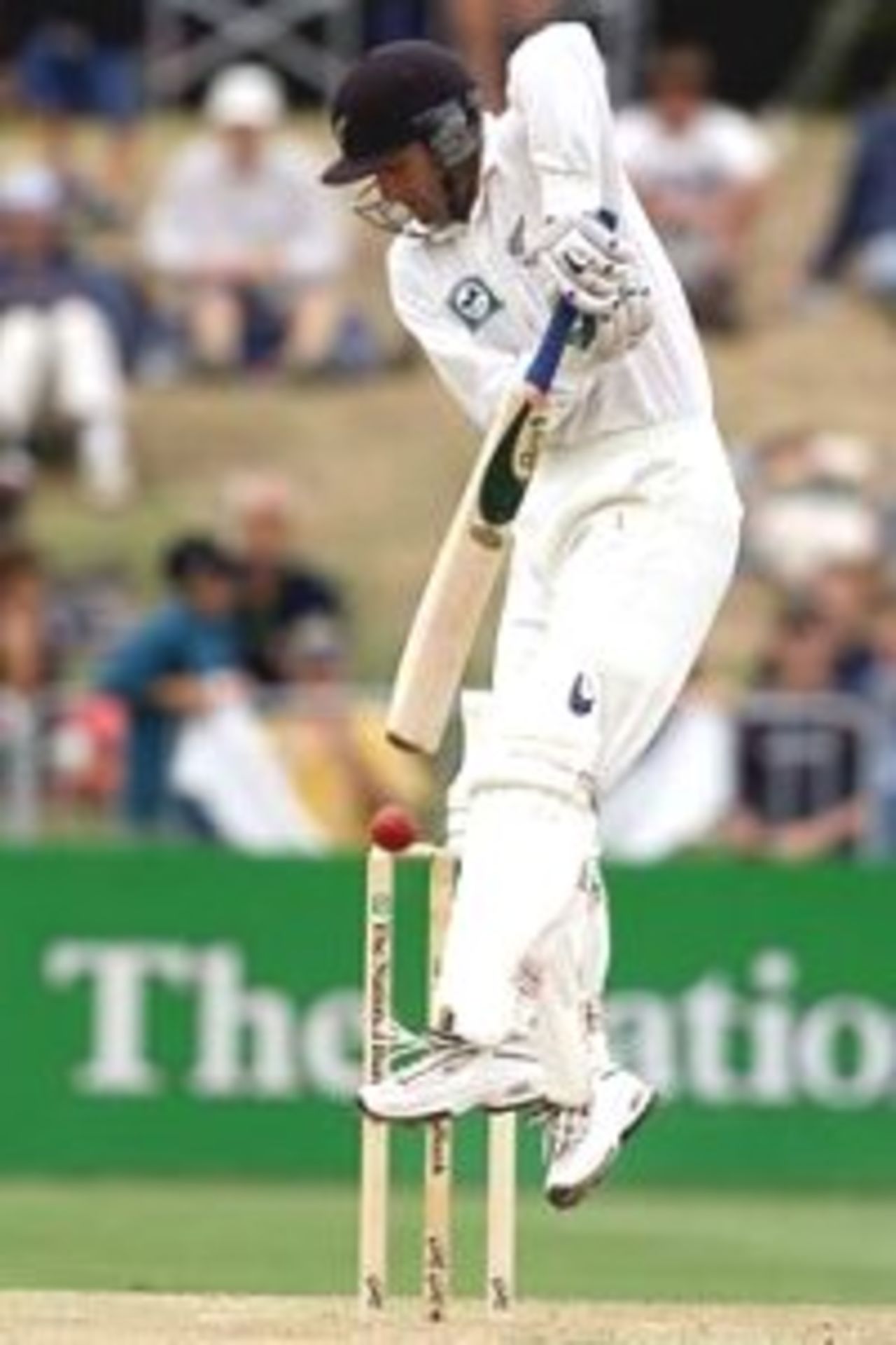 02 Apr 2000: Nathan Astle of New Zealand has to leap high to play a delivery, during day three of the third test between New Zealand and Australia, at WestpacTrust Park, Hamilton, New Zealand.