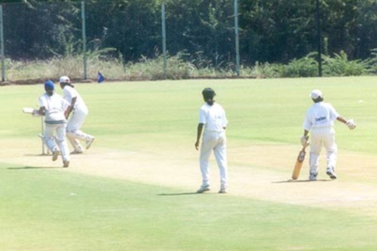 L Vaishali is runout as her partner Amritha Shinde looks on, South Zone Women v West Zone Women, Rani of Jhansi Women's (Inter-zonal) Tournament 1999/00, IIT-Chemplast Ground Chennai, 3 April 2000