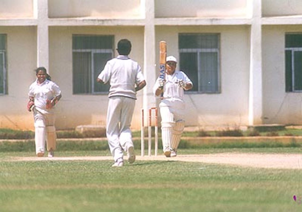 S Priyanka of Central Zone has her bails clipped by Jhulan of East Zone as wicket keeper Gita rejoices, Central Zone Women v East Zone Women, Rani of Jhansi Women's (Inter-zonal) Tournament 1999/00, S Ramachandra Medical College Ground Chennai, 05 April 2000
