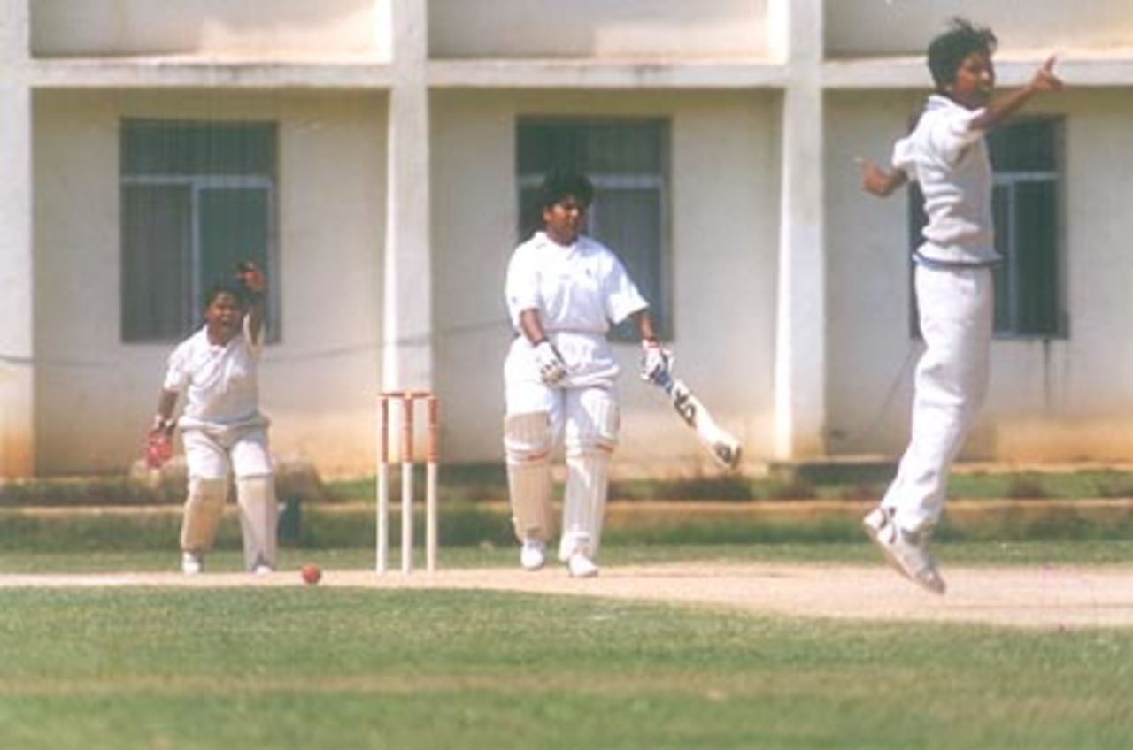 A vociferous appeal for lbw by East Zone's bowler Jhulan  and wicket keeper S Gita turned down as a bemused Chitra Bajpai looks on Central Zone Women v East Zone Women, Rani of Jhansi Women's (Inter-zonal) Tournament 1999/00, S Ramachandra Medical College Ground Chennai, 05 April 2000