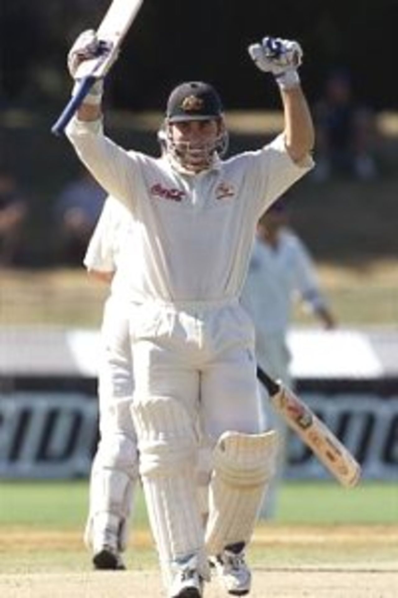 03 Apr 2000: Justin Langer of Australia celerbates his century, during day four of the third test between New Zealand and Australia, at WestpacTrust Park, Hamilton, New Zealand. Australia won by six wickets, to win the series 3-0.