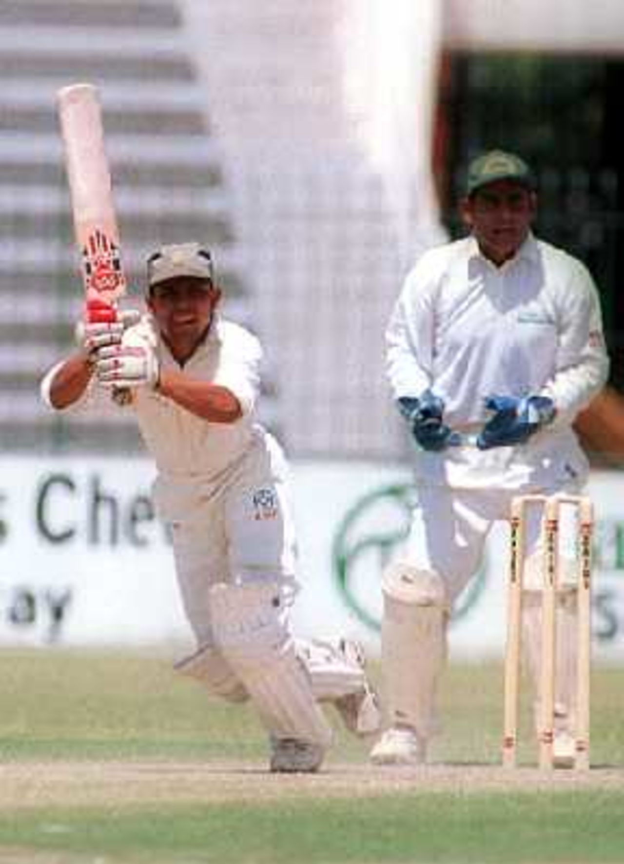 Kamal Akmal of NBP plays an on-drive against Habib Bank during the final round match at the Gaddafi Stadium, Lahore. 6 April 2000.