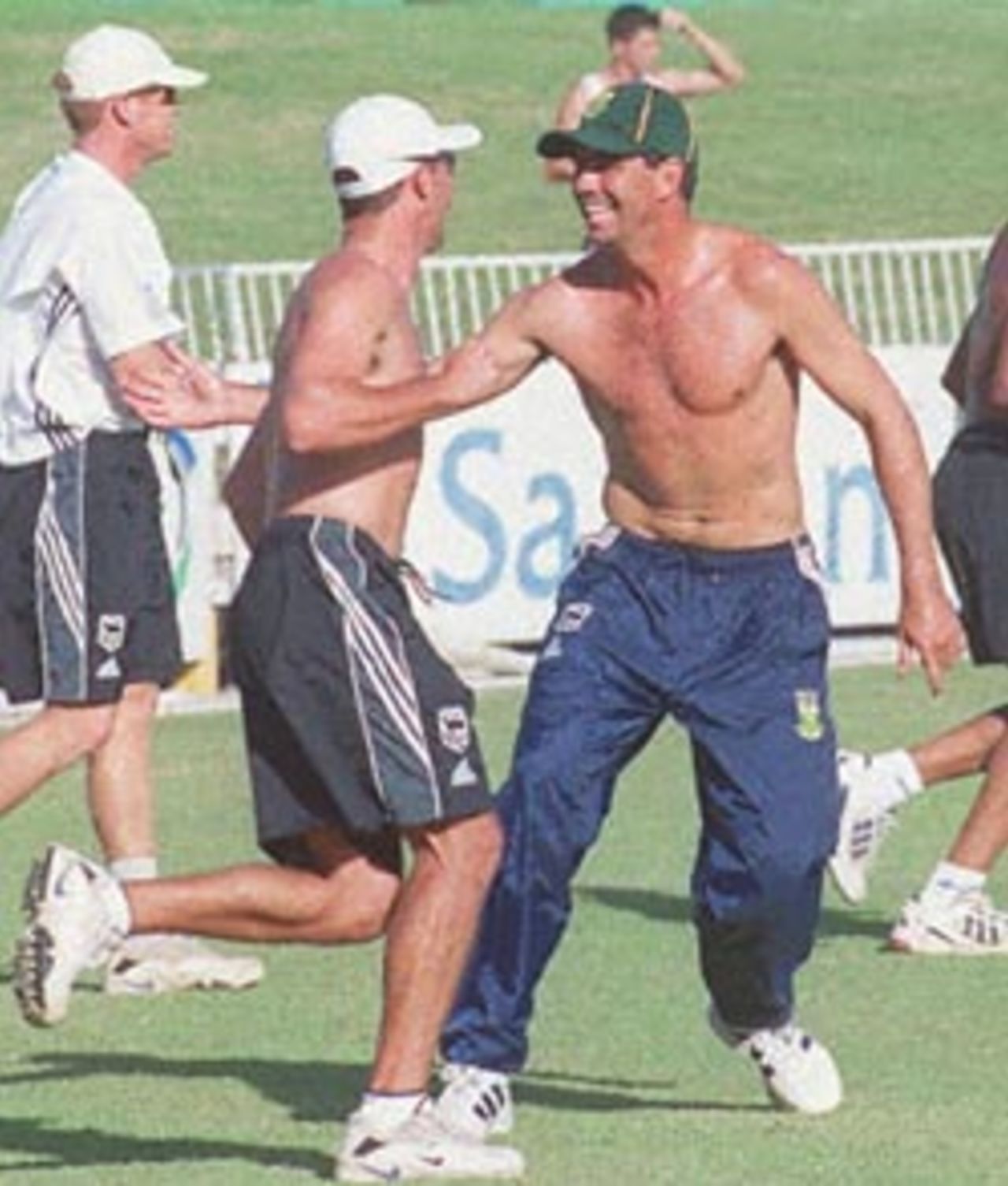 South African national cricket team captain Hansie Cronje (C) trains with teammates 10 April 2000 at the Kingsmead cricket grounds in Durban ahead of the one-day series against Australia. Cronje and three other players have been alleged to be involved in match fixing on their recent tour to India.