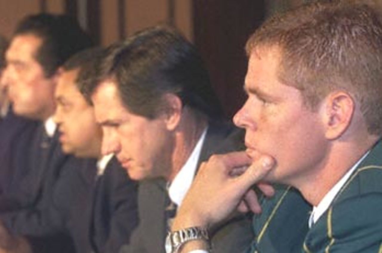 Shaun Pollock (R), and from left, managing director of the South African United Cricket Board (UCB) Ali Bacher, UCB President Percy Sonn and the UCB lawyer Clifford Green addresses media at a press conference in Durban, 11 April 2000. Pollock was named new captain for the national cricket team after Hansie Cronje has been suspended after being implicated in a match fixing scam.