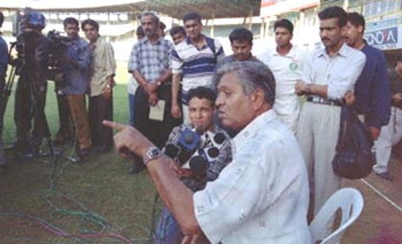 President of the Board of Indian Cricket Selection Committee, Chandu Borde gives his rections to the reporters at the Wankhede Stadium on 11 April 2000,in Bombay,on receiving message of Hansie Cronje the South African cricket captain was sacked from the on comming one-day series with Australia,for accepting money 10,000 and 15,000 dollars for matching fixing in the triangular series in India.