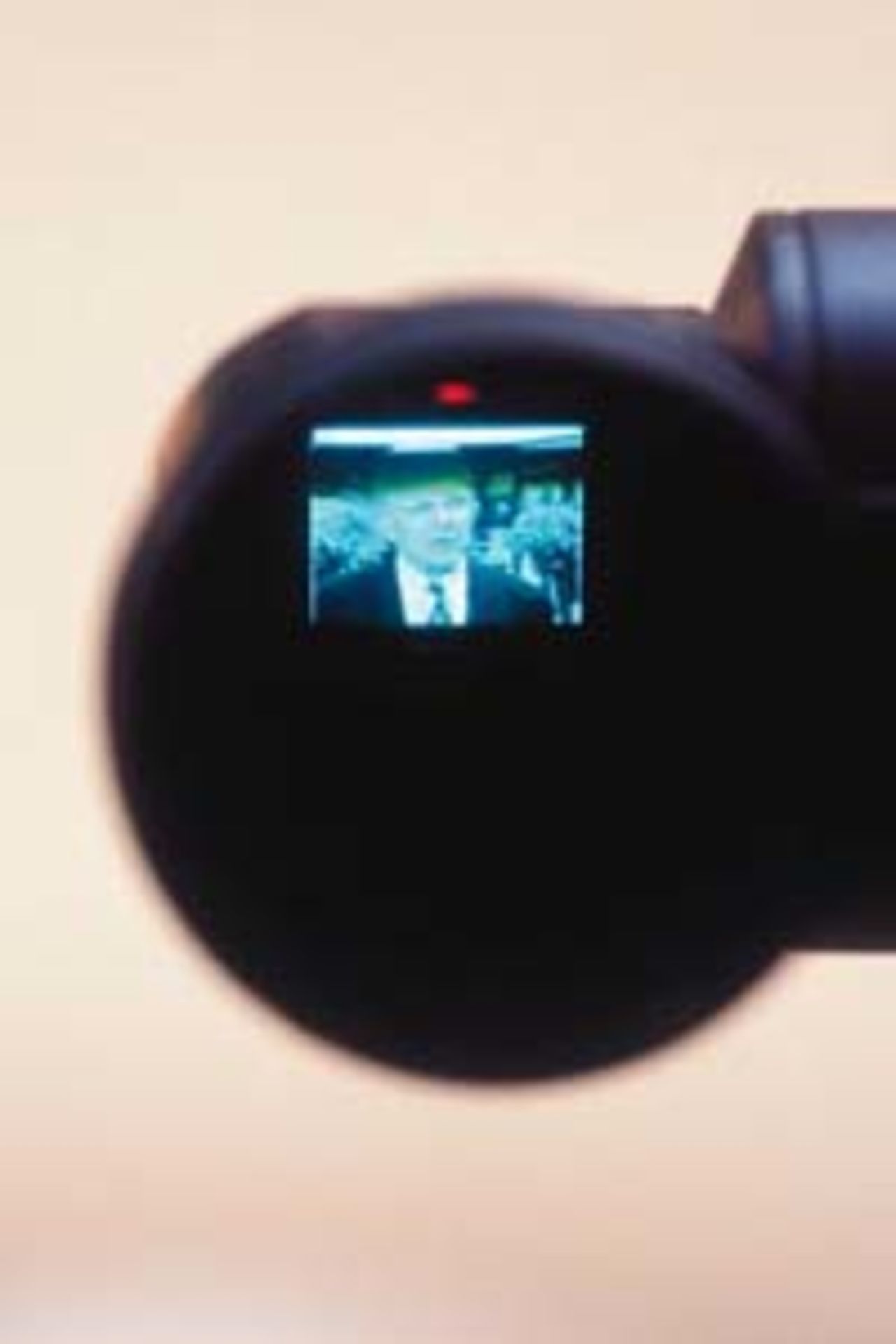 Malcolm Speed seen through a camera lense