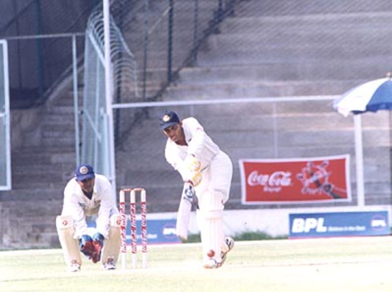 Azharuddin driving Sunil Joshi, Karnataka v Hyderabad Ranji Trophy Semi Final (Day 1), M Chinnaswamy Stadium Bangalore, 11-15 Apr 2000.