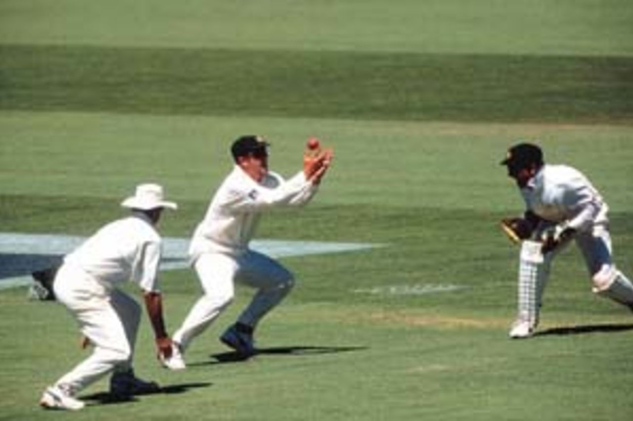 Mark Taylor takes his 157th catch to break Allan Border's Test catches by a fielder record. Australia v England, 1998/99