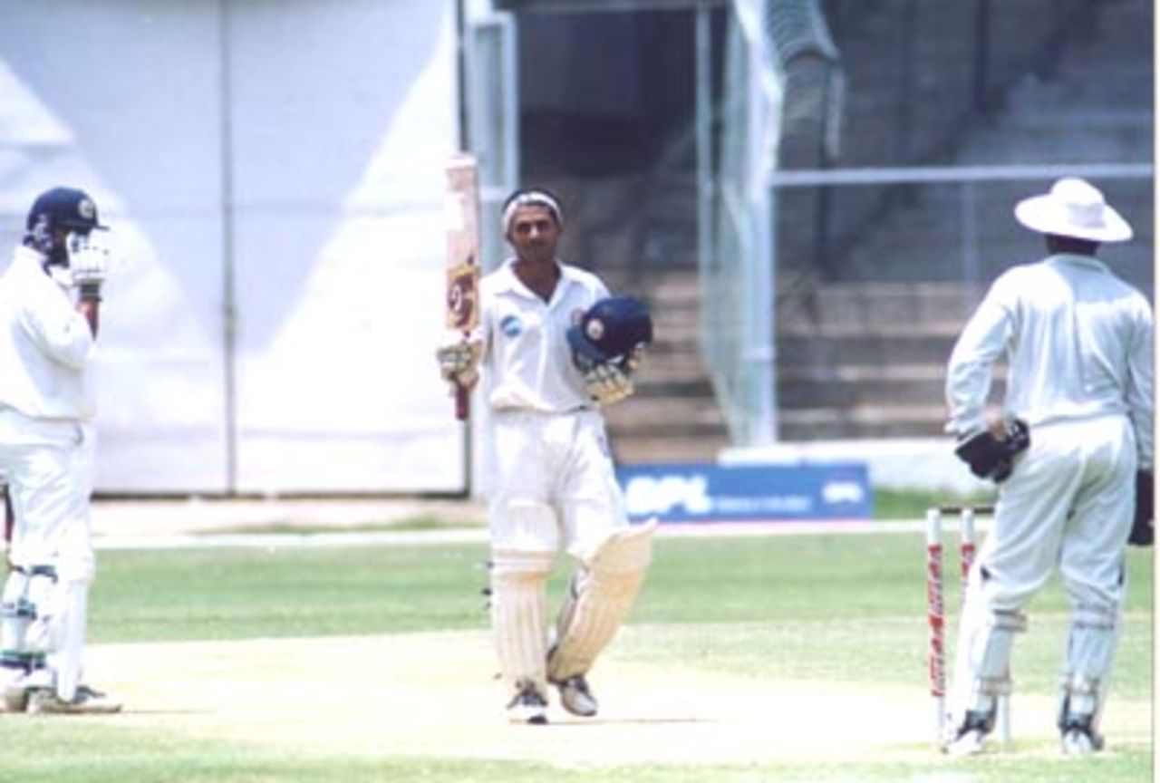 Mithun Beerala celebrating his half century, Karnataka v Hyderabad Ranji Trophy Semi Final (Day 3), M Chinnaswamy Stadium Bangalore, 11-15 Apr 2000.