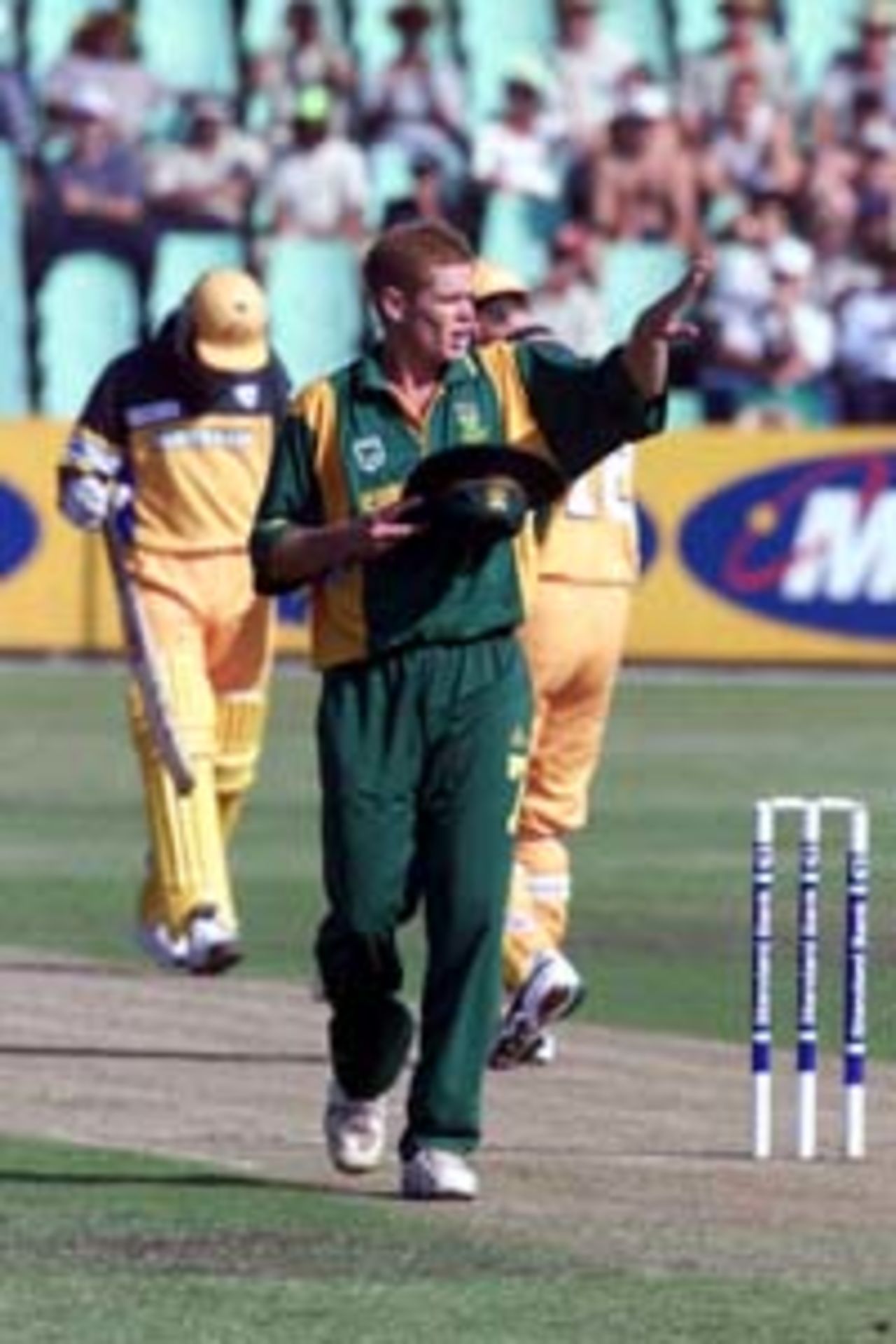 12 Apr 2000: Shaun Pollock of South Africa, captaining the side following the sacking of Hansie Cronje, adjusts his field during the first game of the One Day International Series between South Africa and Australia at Kingsmead, Durban, South Africa.
