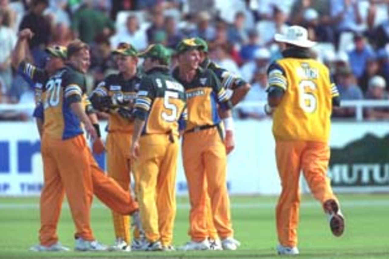 14 Apr 2000: Shane Lee and Adam Gilchrist of Australia celebrate the wicket of Neil McKenzie of South Africa during the 3 match series of South Africa v Australia at Newlands, Cape Town, South Africa.