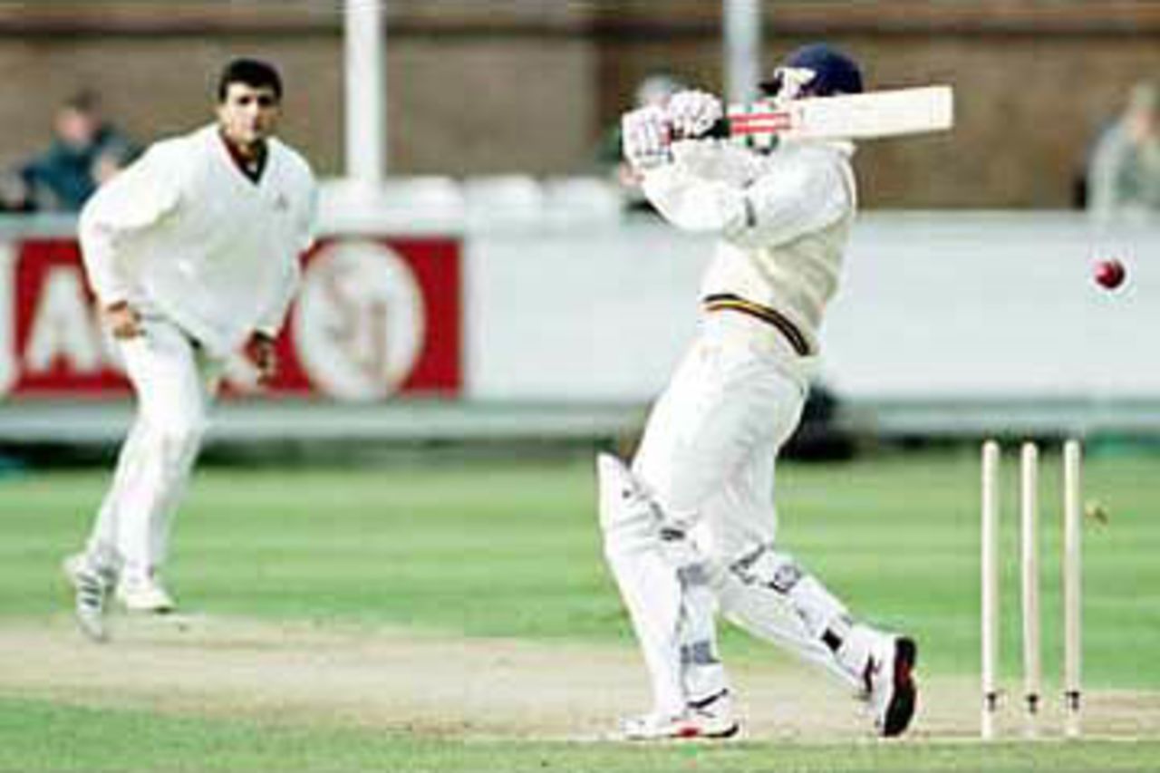 John Lewis is bowled out by Saurav Ganguly, Durham v Lancashire, Benson & Hedges, April 2000