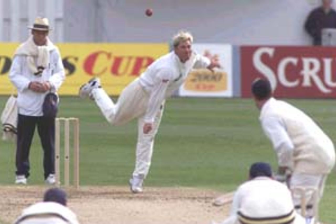 23 Apr 2000: Shane Warne of Hampshire bowls at Michael Bevan of Sussex during the Benson and Hedges game between Sussex and Hampshire at the County Ground Hove, Brighton.