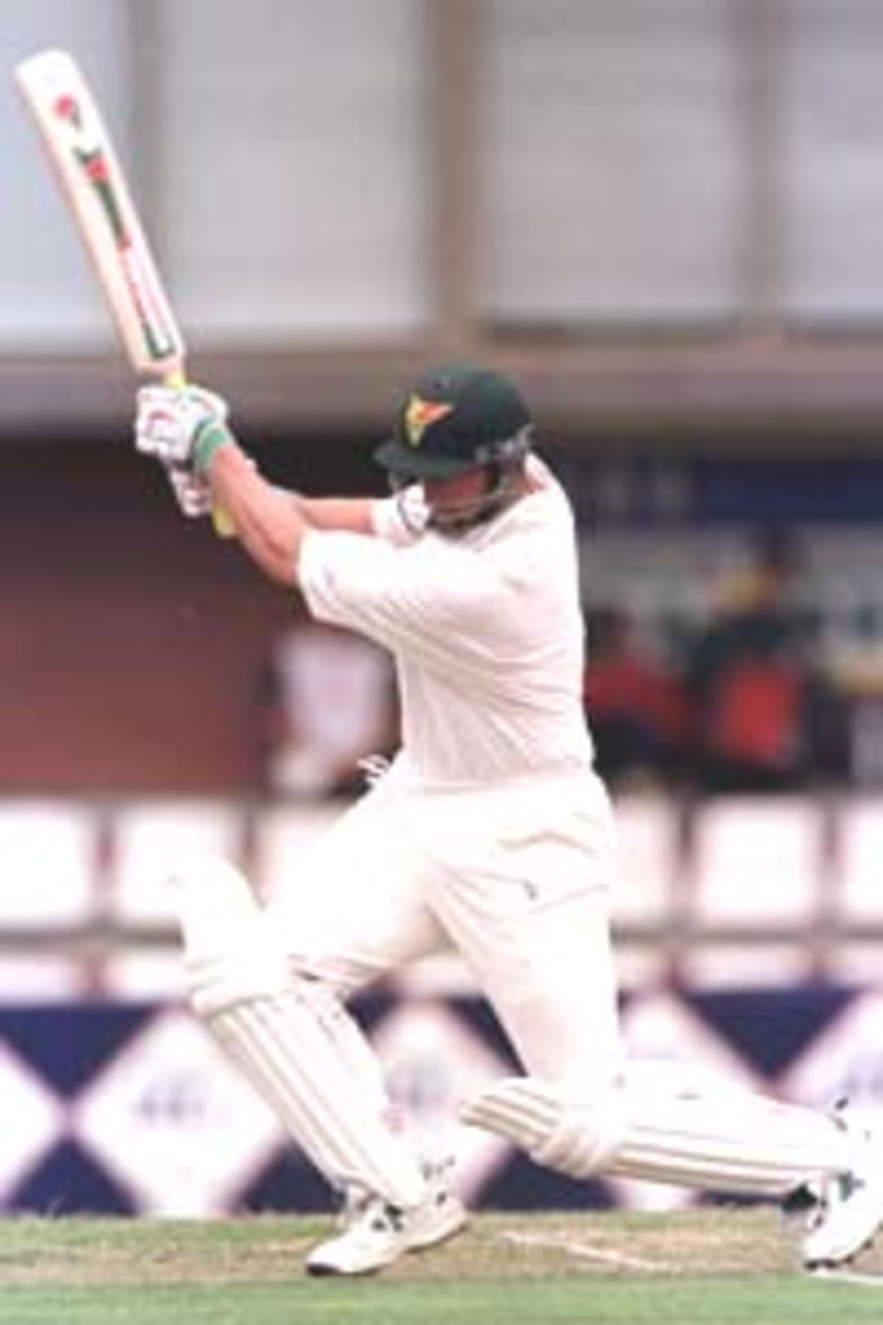 28 Jan 2000: Michael Di Venuto of Tasmania, smashes a ball to the boundry on his way to scoring a 136 runs during the first innings of the Pura Milk Cup match between Tasmania and New South Wales, played at the Bellerive Oval, Hobart, Australia. Tasmania ended their innings on 5 for 510 declared, alead of 426 runs.