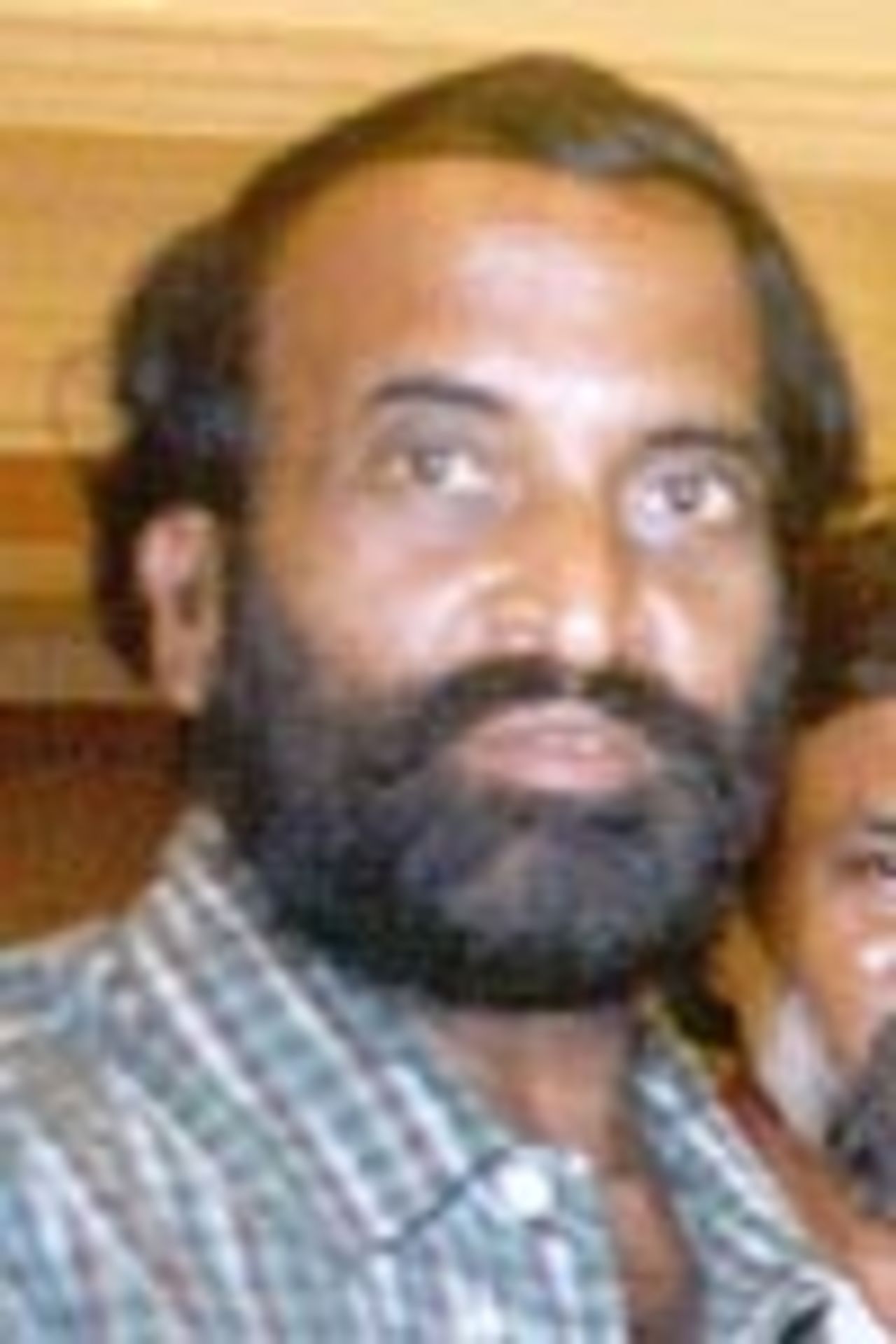 K Murali, Umpire, Portrait