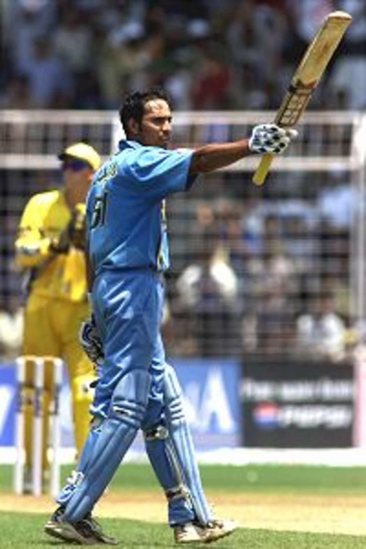 VVS Laxman of India reaches 100, during the 5th One Day International between India and Australia at the Nehru Stadium, Fatorda, Goa, India.