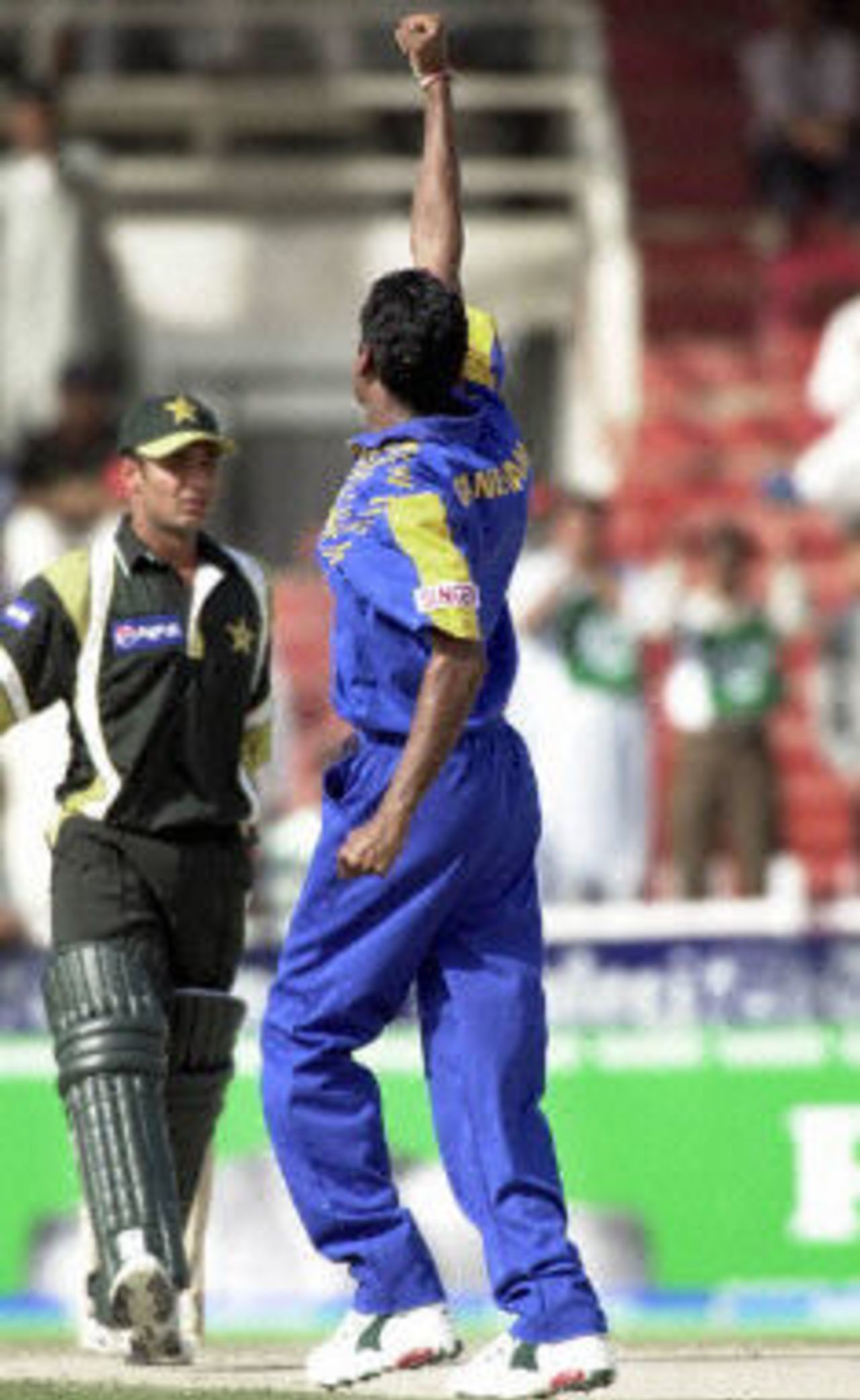 Ganegama clebrates after getting Imran Farhat leg before, ODI 1 at Sharjah, Pakistan v Sri Lanka, 9 April 2001