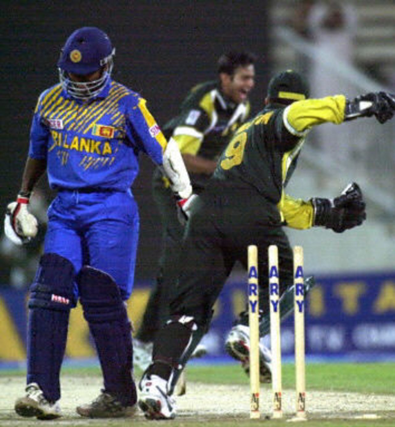 Romesh Kaluwitharana looks dejected, after being clean bowled by Shoaib Malik, Ary Gold Cup, ODI 1 at Sharjah, Pakistan v Sri Lanka, 9 April 2001