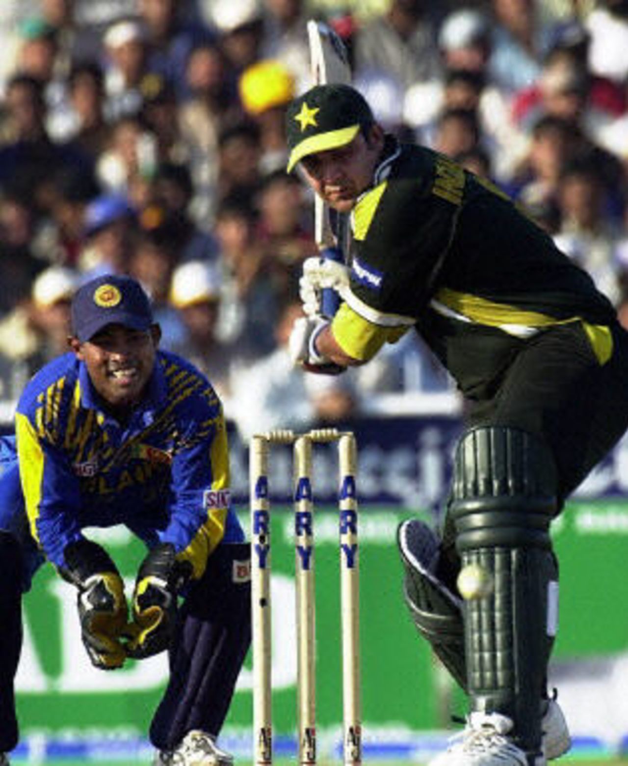 Inzamam-ul-Haq drives Muralitharan, ODI 4 at Sharjah, Pakistan v Sri Lanka, 13 April 2001