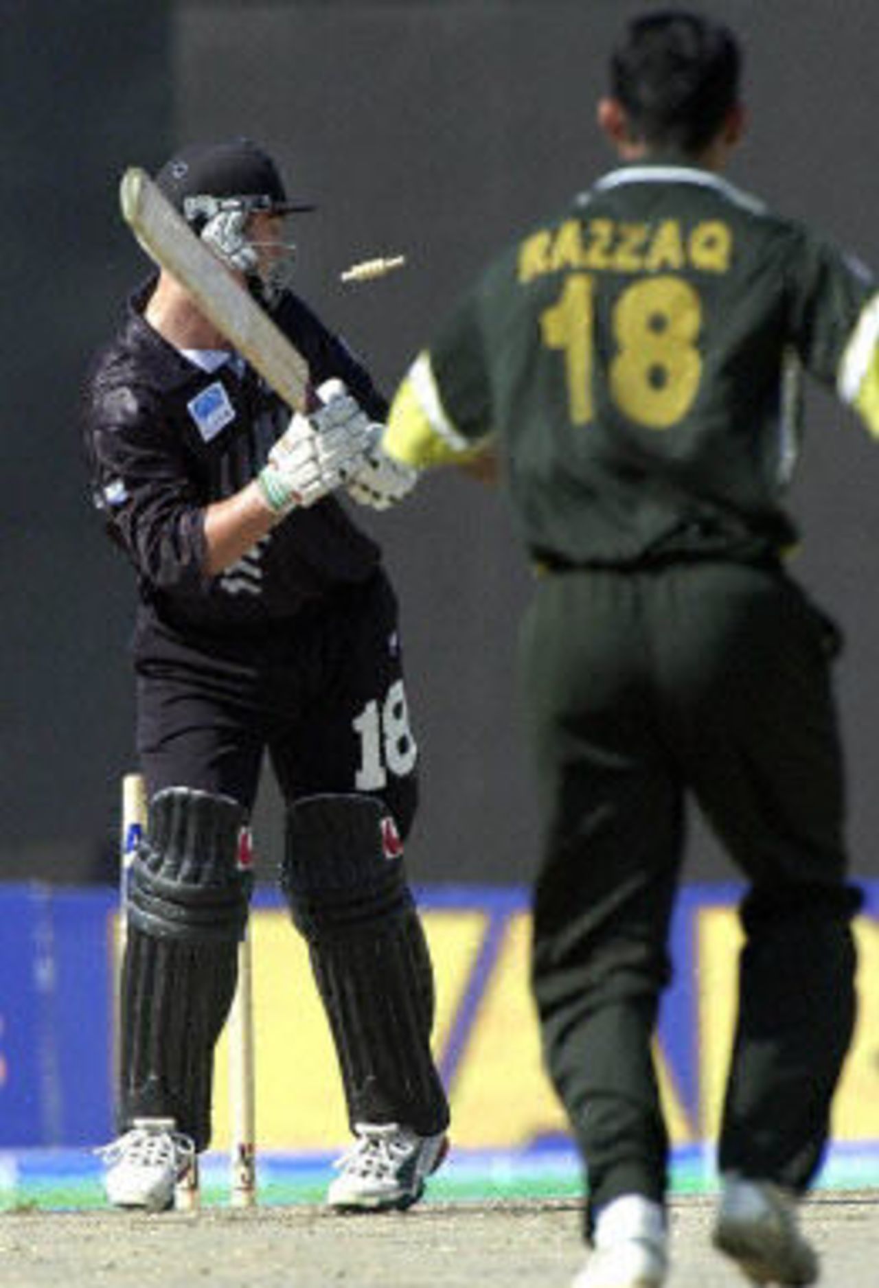 Matthew Sinclair faces his shattered stumps after being clean bowled  by Abdur Razzaq, ODI5 at Sharjah, New Zealand v Pakistan, 15 April 2001