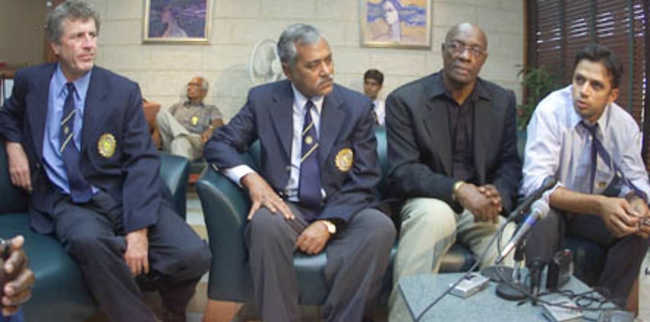 Indian coach John Wright, manager Goutam Dasgupta, WICB president Rev. Wes Hall and Indian skipper Rahul Dravid answer questions at a press conference