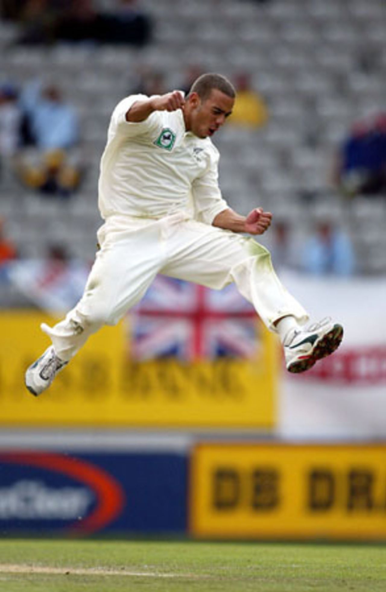 New Zealand bowler Andre Adams jumps to celebrate the dismissal of England batsman James Foster, caught by wicket-keeper Adam Parore his second innings for 23. 3rd Test: New Zealand v England at Eden Park, Auckland, 30 March-3 April 2002 (3 April 2002).