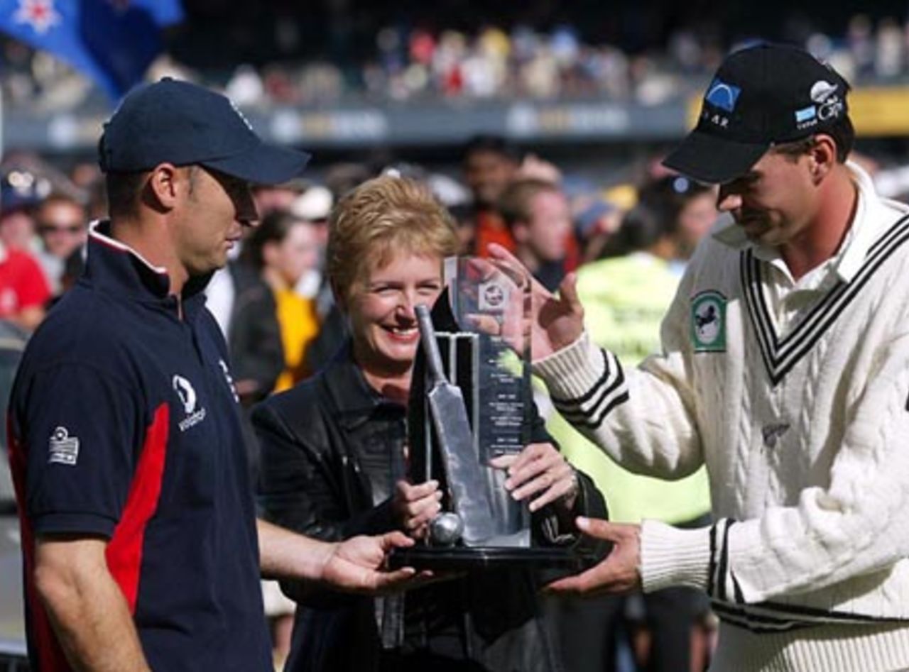 The National Bank of New Zealand head of corporate affairs Cynthia Brophy (centre) with captains Nasser Hussain (left) from England and Stephen Fleming from New Zealand and the National Bank Series trophy after the 3-Test series was drawn 1-1. 3rd Test: New Zealand v England at Eden Park, Auckland, 30 March-3 April 2002 (3 April 2002).