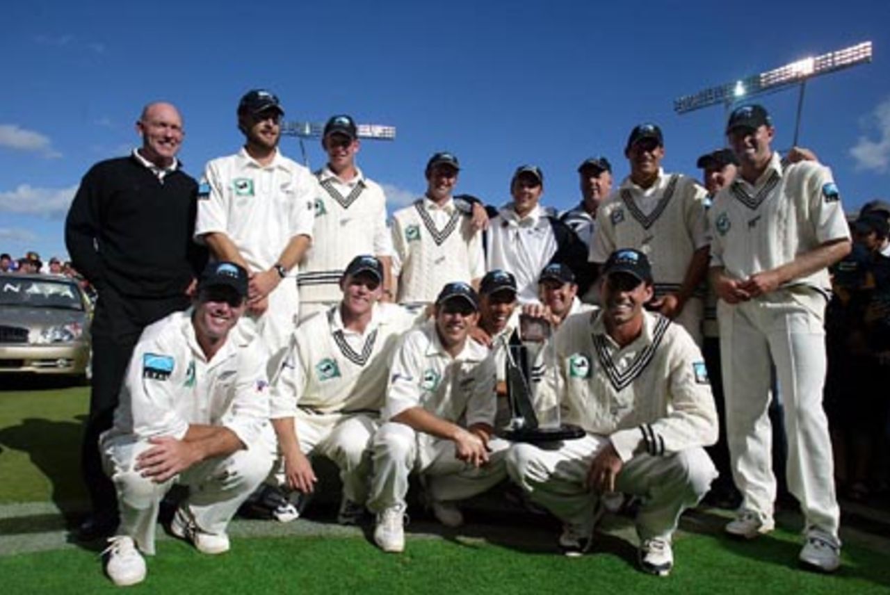Members of the New Zealand team with the National Bank Series trophy, shared with England after the 3-Test series was drawn 1-1. Back, from left, manager Jeff Crowe, Daniel Vettori, 12th man Ian Butler, Chris Harris, Craig McMillan, coach Denis Aberhart, Daryl Tuffey, substitute fielder Brooke Walker and Chris Drum. Front, from left, Mark Richardson, Lou Vincent, Adam Parore, Andre Adams, Nathan Astle and captain Stephen Fleming. 3rd Test: New Zealand v England at Eden Park, Auckland, 30 March-3 April 2002 (3 April 2002).