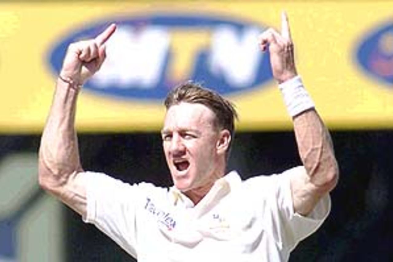 3 Mar 2002: Andy Bichel of Australia celebrates getting the wicket of Darryl Cullinan of South Africa for 16 during the South Africa A v Australia match played in Port Elizabeth, South Africa.