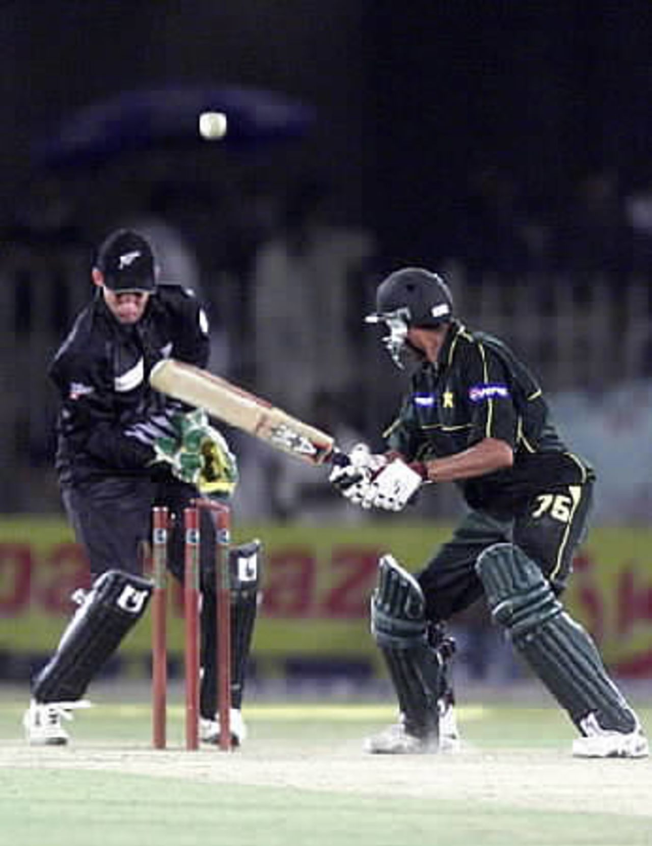 Younis Khan plays on as Robbie Hart watches, after his knock of 70 - ODI2 at Rawalpindi, New Zealand v Pakistan, 24 Apr 2002