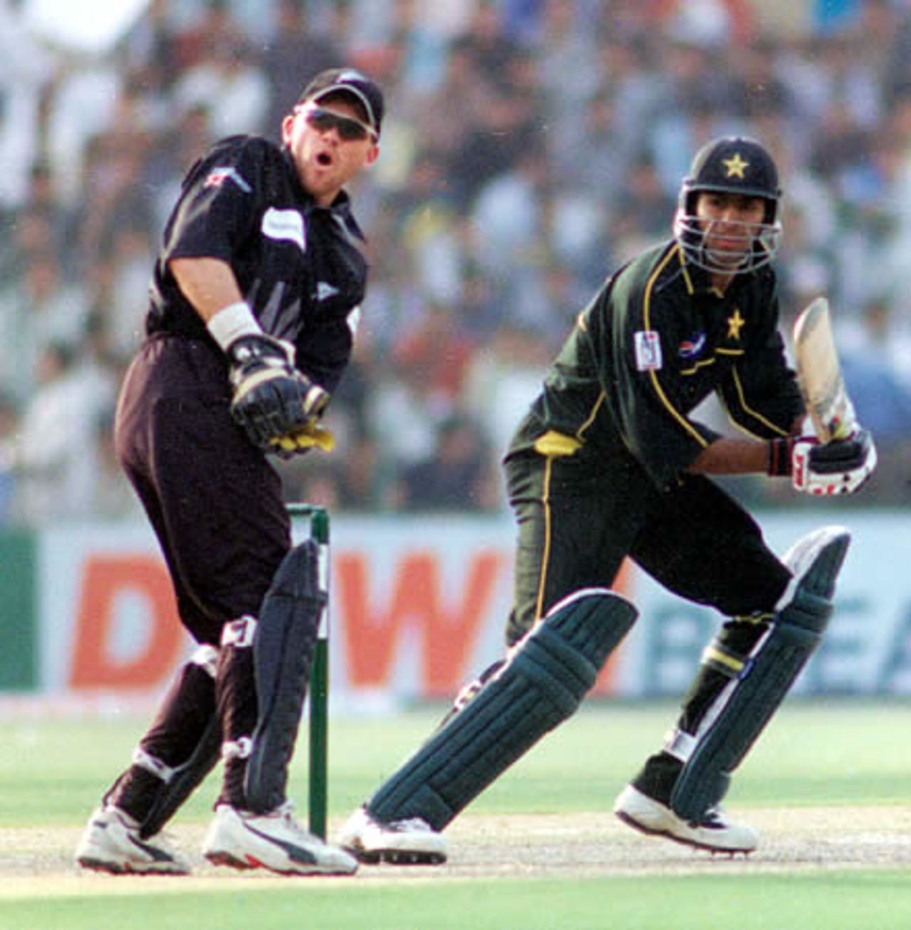 Shoaib Malik cuts to third man watched by Lou Vincent - 3rd ODI at Lahore, New Zealand v Pakistan, 27 Apr 2002