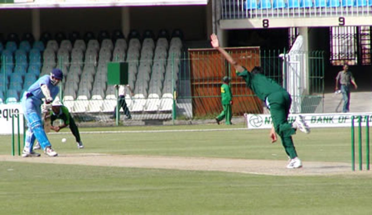 Umar Gul has Adil Nisar leg before, NBP Patron's Cup final, Gaddafi Stadium, 31 March 2003