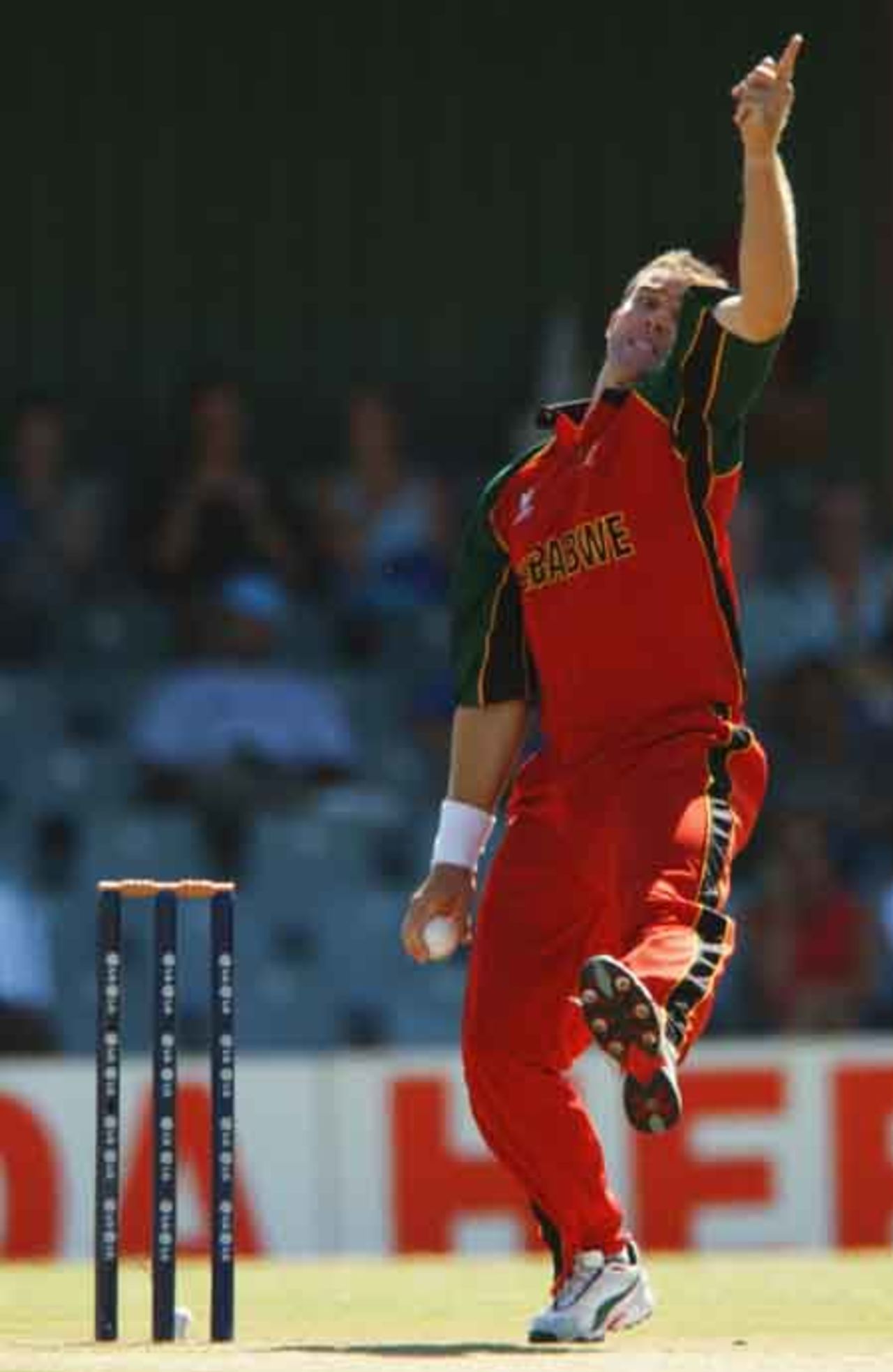 Heath Streak of Zimbabwe bowls during the ICC Cricket World Cup Super Six match between Sri Lanka and Zimbabwe held on March 15, 2003 at Buffalo Park in East London, South Africa.