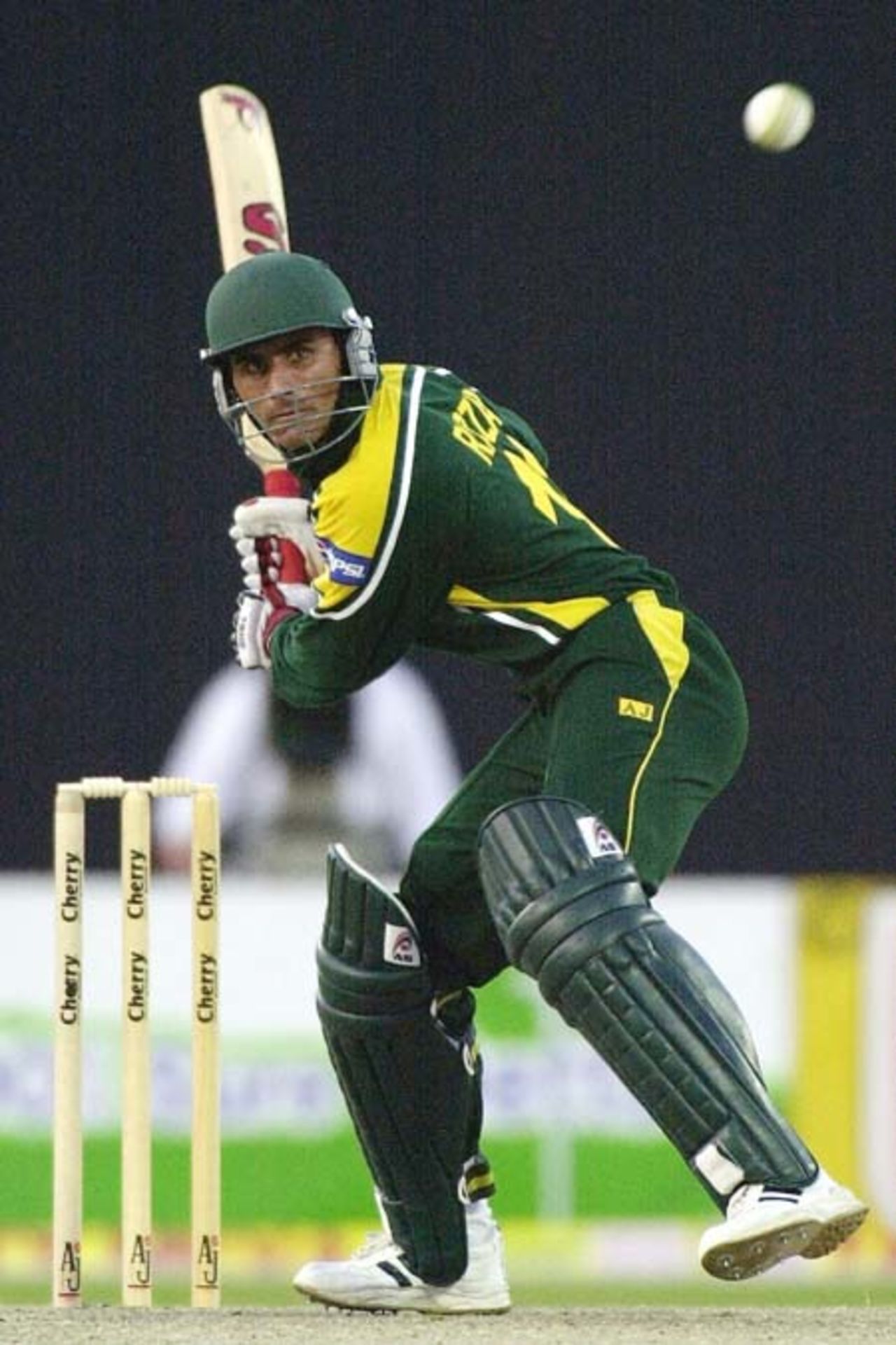 Pakistani all-rounder Abdul Razzaq concentrates on a ball to hit a six during his 76 runs inning in the first ODI against Zimbabwe in Sharjah, 03 April 2003.