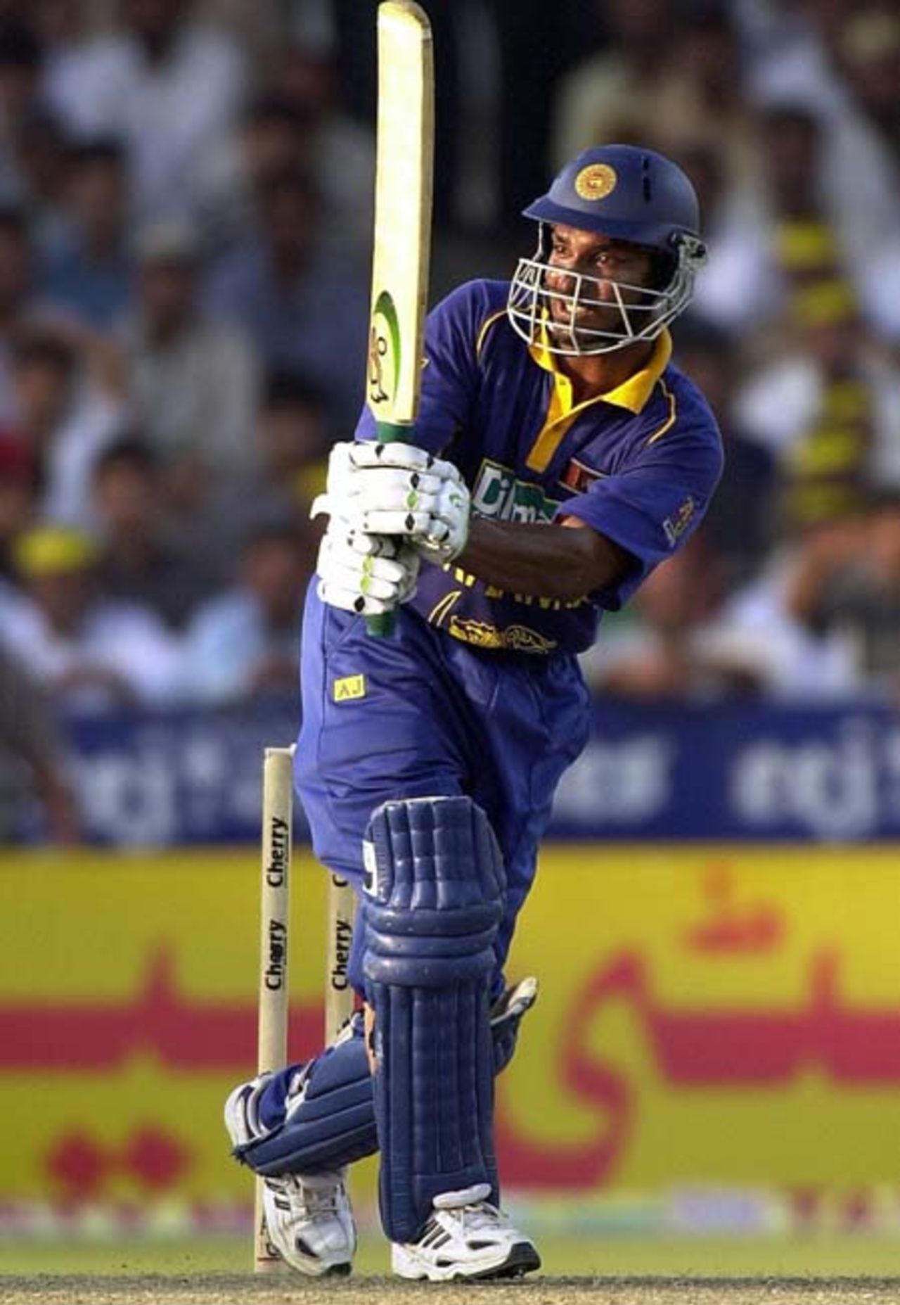 Sri Lankan middle order batsman and the highest scorer Kumar Sangakkara plays during his brilliant century inning against Pakistan in the Four Nation Sharjah Cricket Tournament, 04 April 2003.