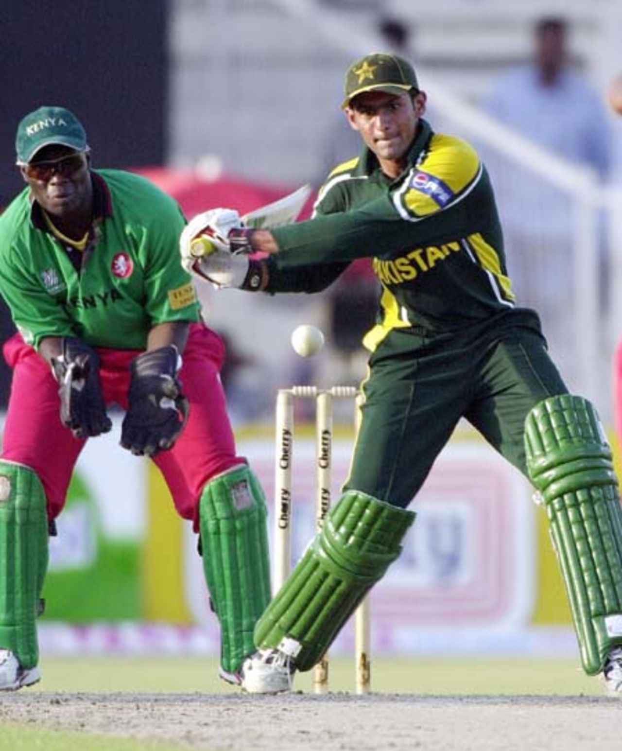 Pakistani middle order batsman and top scorer Shoaib Malik (C) plays a ball during his fine inning of 76 against Kenya in the Four Nation Sharjah Cricket Tournament, 08 April 2003.