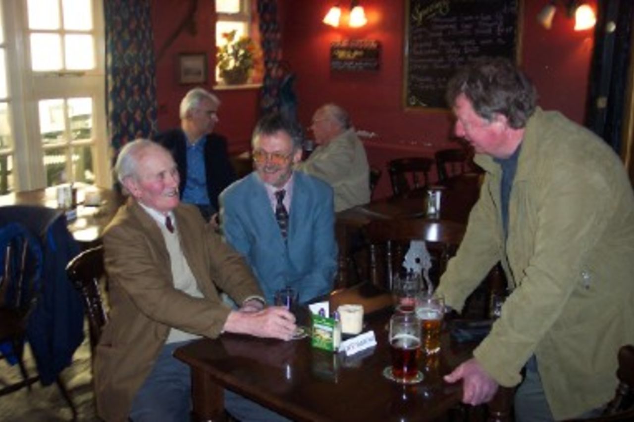 Former Hampshire cricketer Gerry Hill (far left) enjoys a drink on his 90th birthday