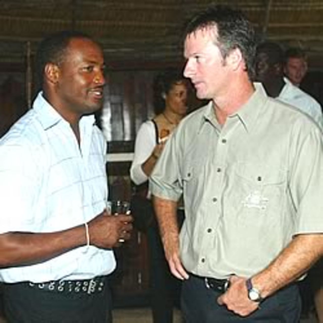GEORGETOWN, Guyana - APRIL 8: Steve Waugh captain of Australia chats with Brian Lara captain of the West Indies during a cocktail function on April 8, 2003 at Le Meridien Pegasus Hotel, Georgetown, Guyana.