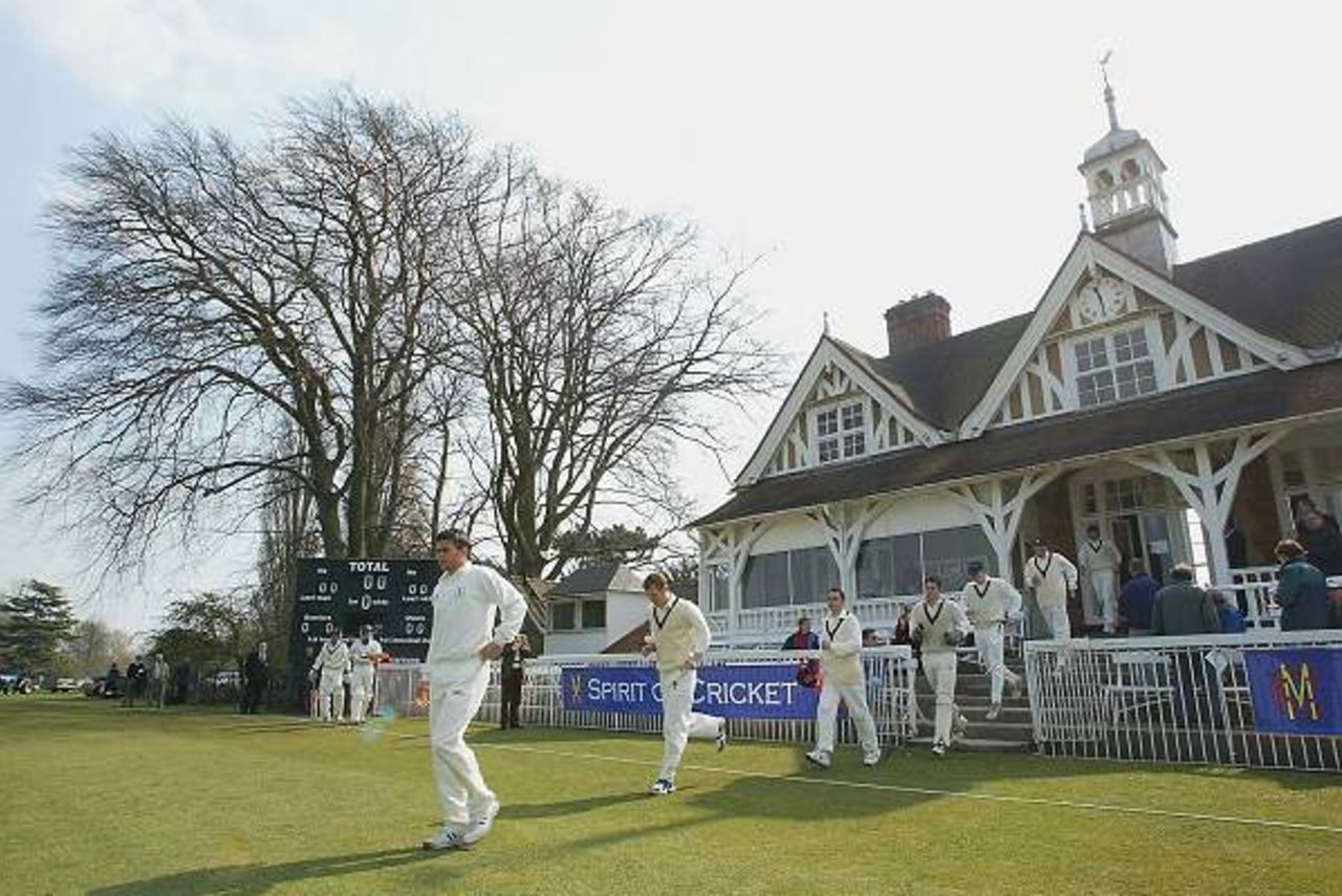 Middlesex players walk onto the pitch for the opening match of the cricket season between Oxford University and Middlesex April 12, 2003 in Oxford, England.