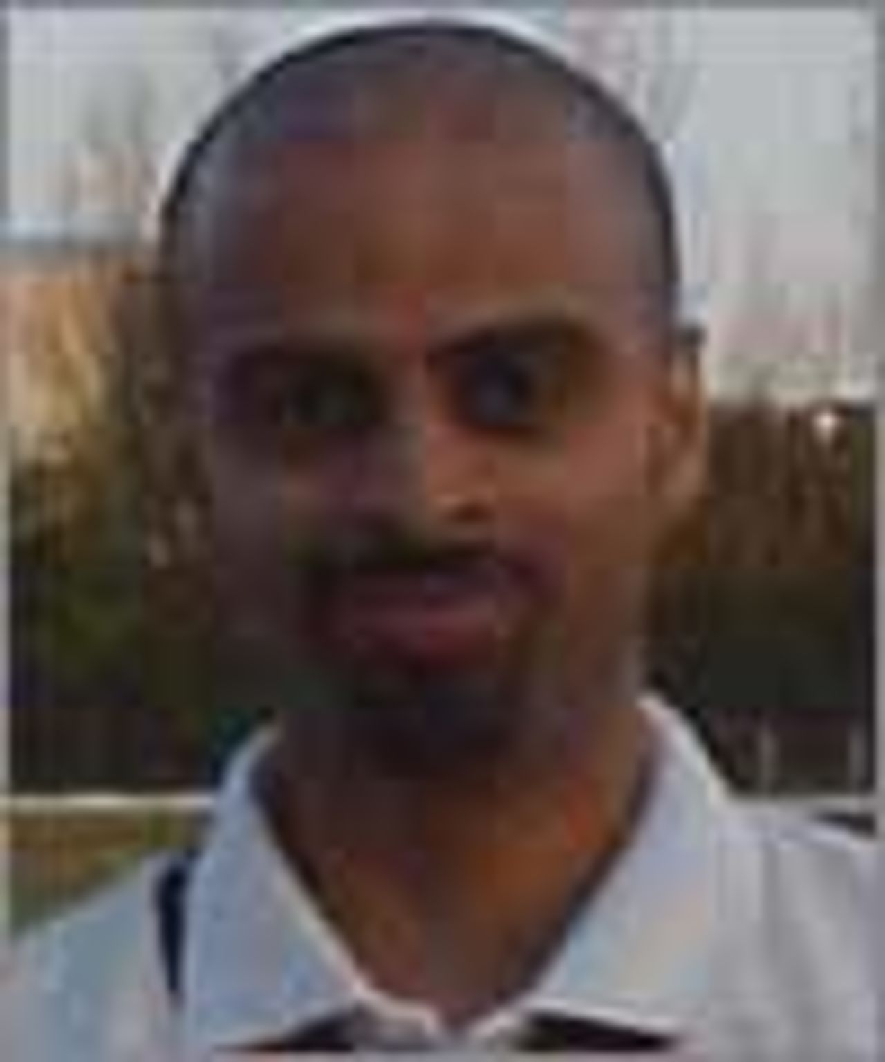 A portrait of Kamran Farooq