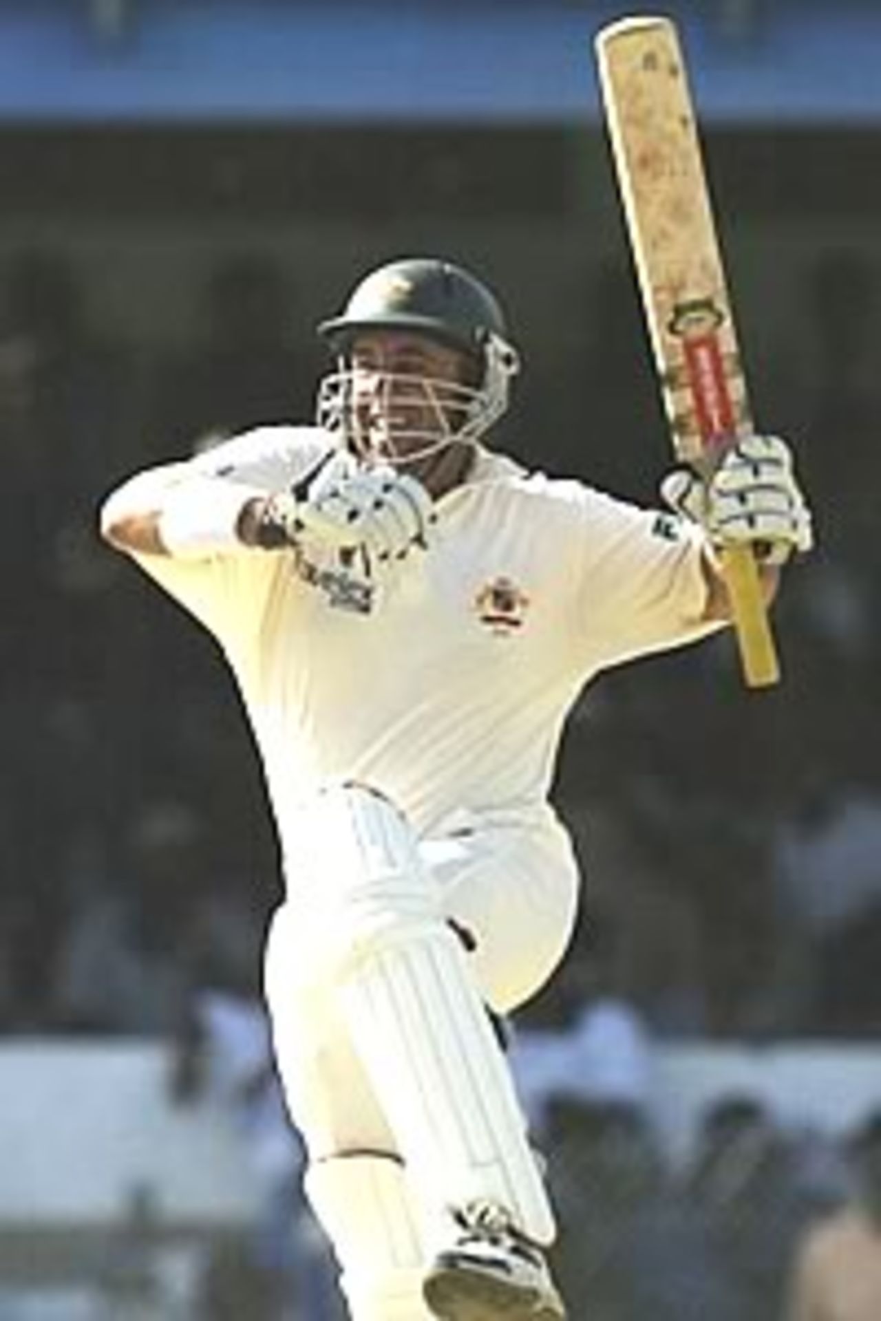PORT OF SPAIN, TRINIDAD - APRIL 19: Darren Lehmann of Australia celebrates his maiden Test century during day one of the Second Test between the West Indies and Australia on April 19, 2003 at Queens Park Oval in Port of Spain, Trinidad.