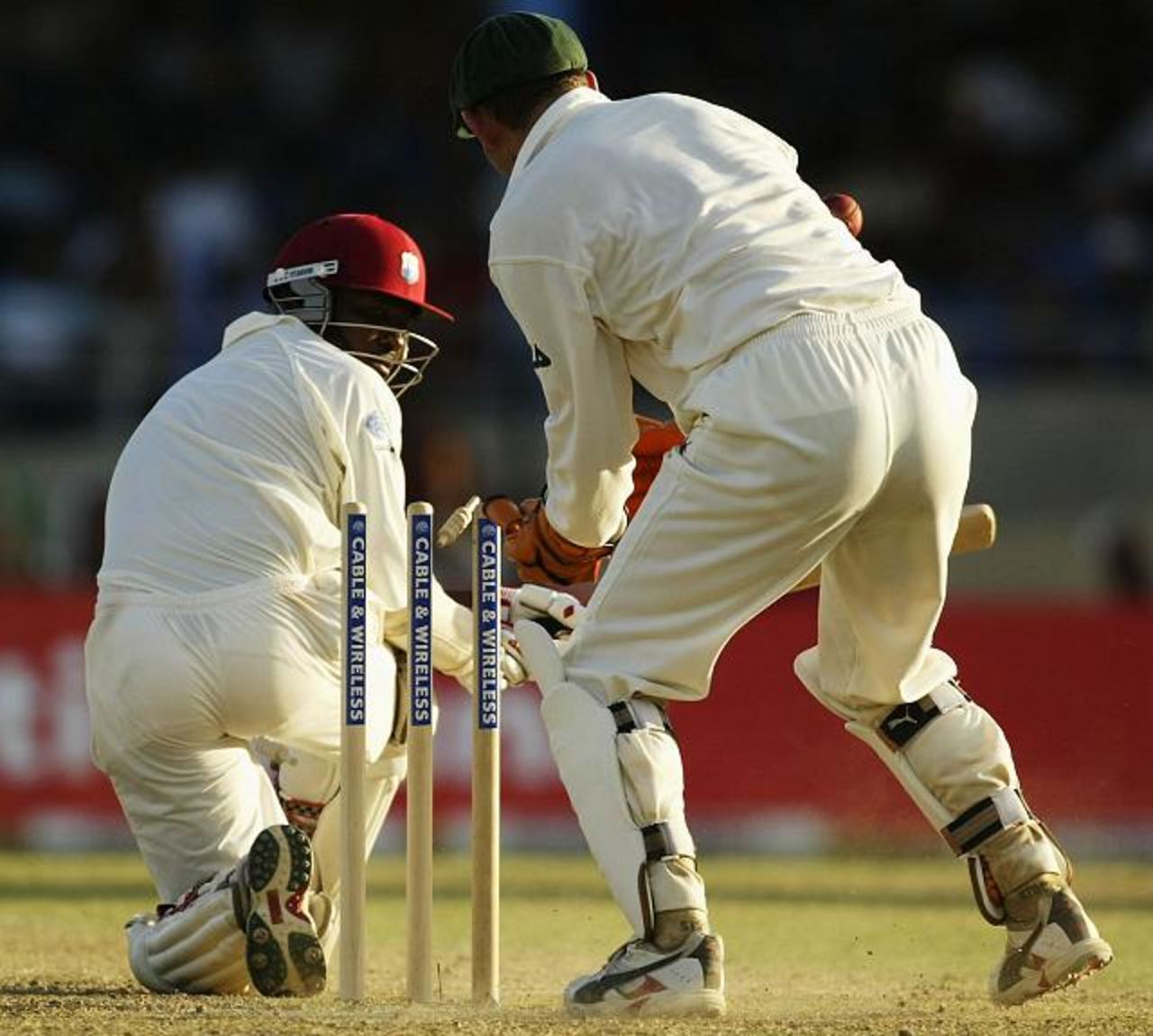 Brian Lara of the West Indies is bowled by Brad Hogg of Australia for 91 during day two of the Second Test between the West Indies and Australia on April 20, 2003 at Queens Park Oval in Port of Spain, Trinidad.