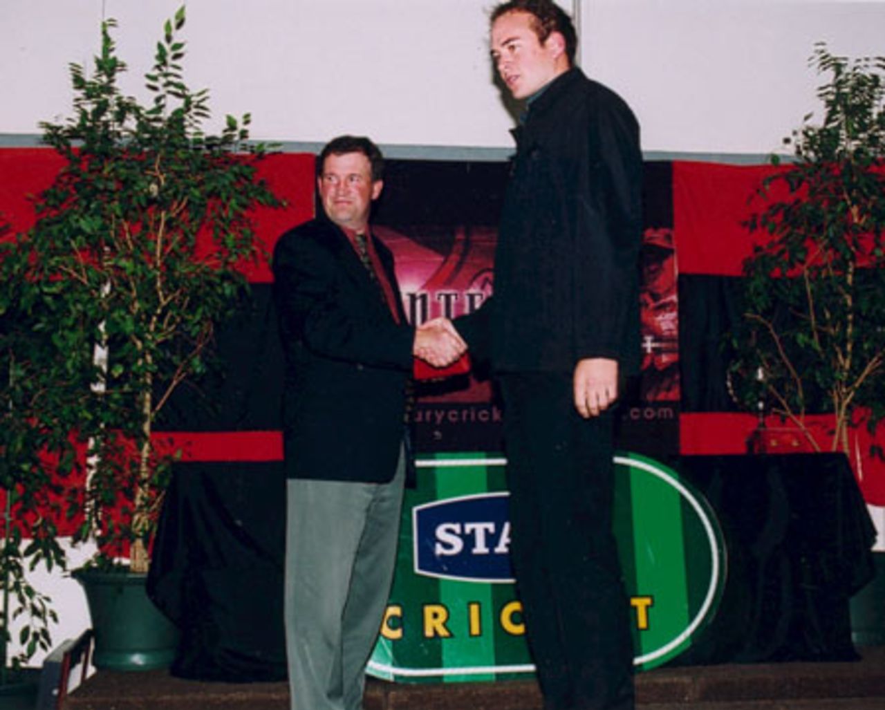 Peter Fulton (right) receives the Canterbury Draught State Canterbury Wizard Batsman of the Year award from David Barley of Canterbury Draught. Canterbury Cricket Association Awards 2002/03 at the Canterbury Horticultural Society Hall at Christchurch, 10 April 2003.