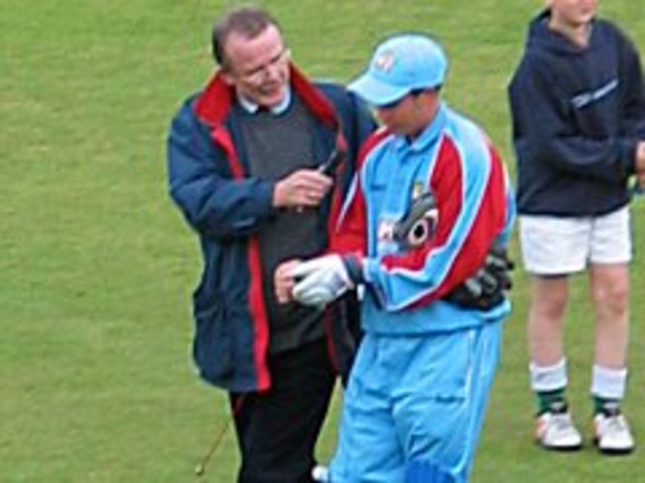 Kent wicket-keeper Geraint Jones is interviewed by Andrew Gidley as he leaves the field after taking 6 catches in the National League match v Leicestershire at Canterbury, a Kent record, 27 April 2003