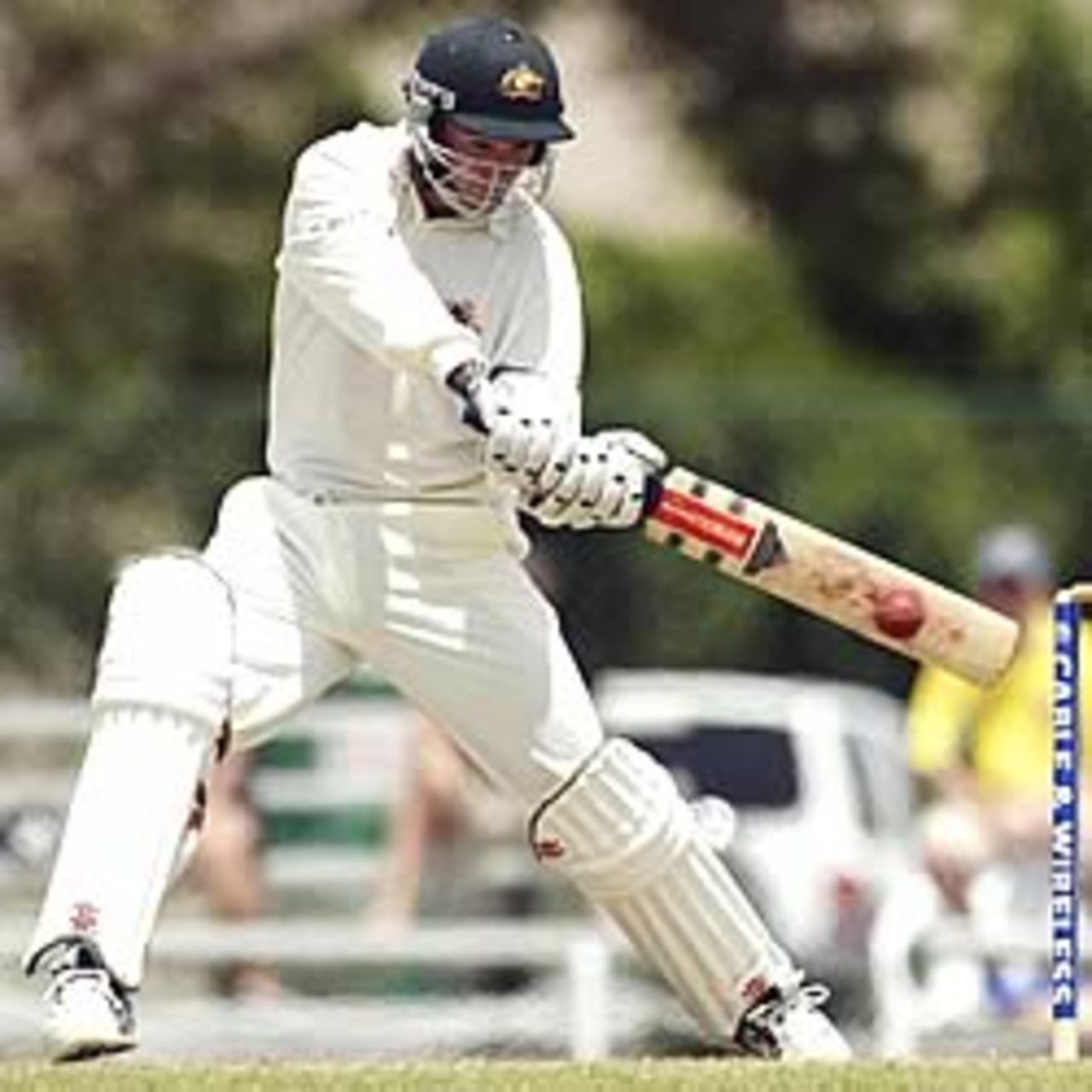 Jimmy Maher hits out during his innings of 142 in the Australians' tour match against the University of West Indies Vice Chancellor's XI