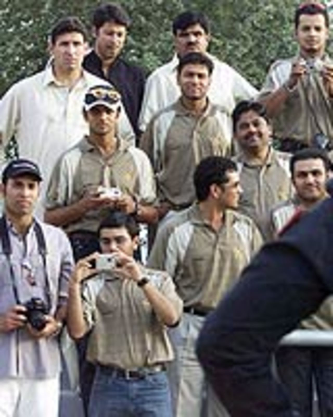 The Indian team takes pictures of the ceremonial change of guard at the Wagah border, a couple of days before the second Test against Pakistan at Lahore, April 2, 2004