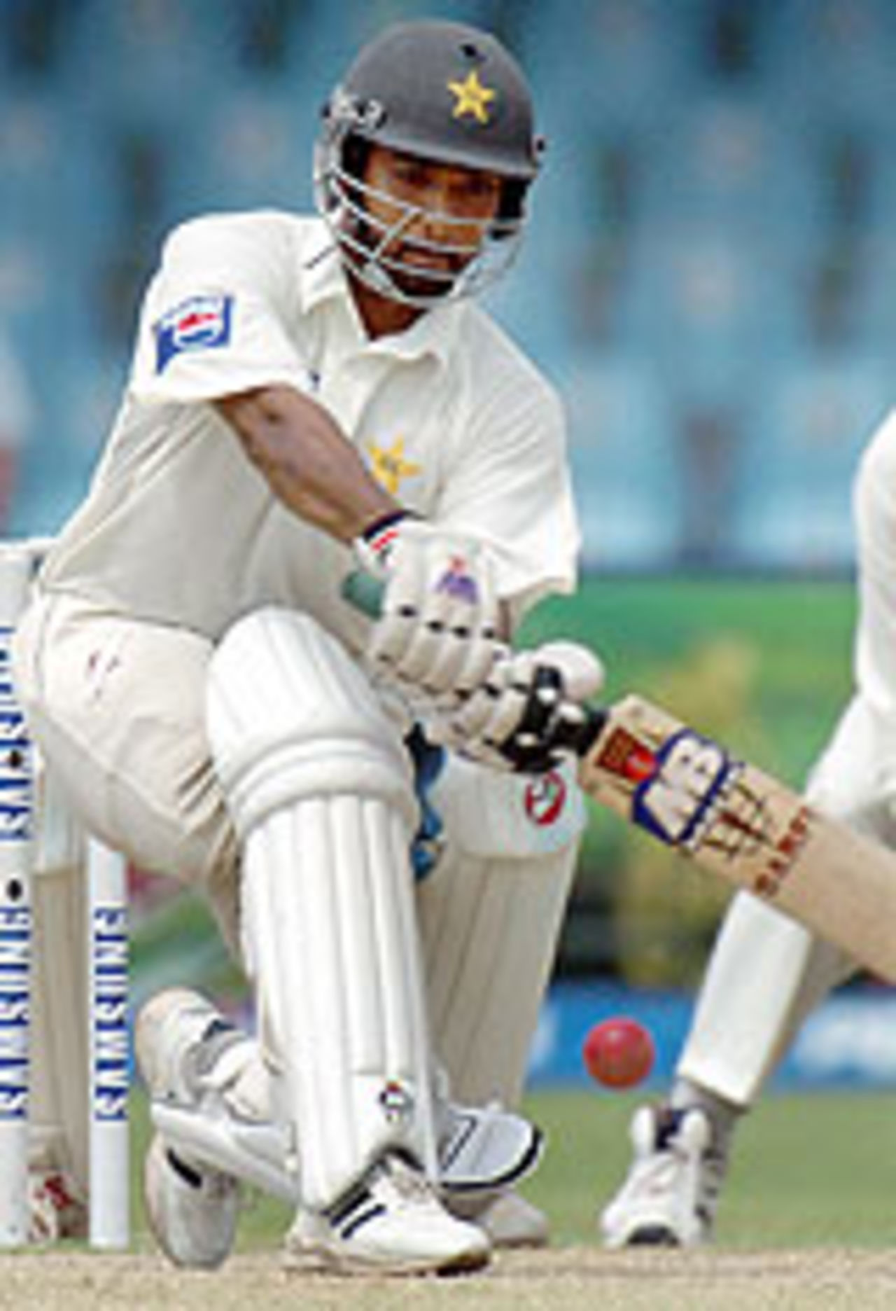 Asim Kamal sweeps yet again, Pakistan v India, 2nd Test, Lahore, 3rd day, April 7, 2004