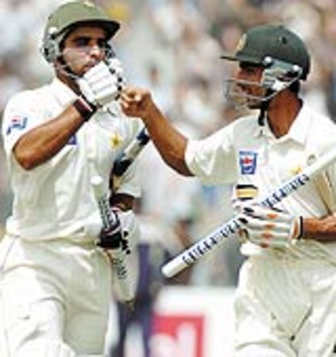 Taufiq Umar and Yasir Hameed celebrate their victory, Pakistan v India, 2nd Test, Lahore, 4th day, April 8, 2004
